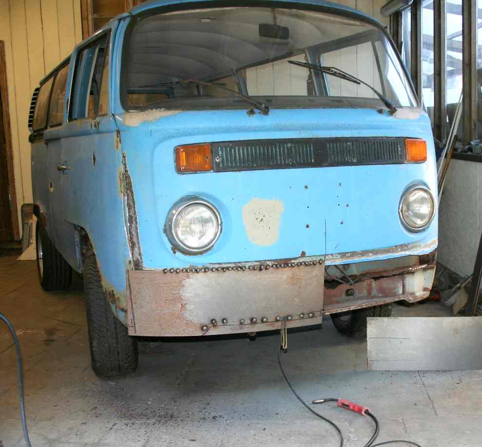With plenty of steel in the corners, new steel panels are attached to Kombi van VW