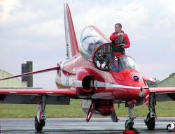 A Red Arrows pilot exits his Hawk aircraft at the end of the display