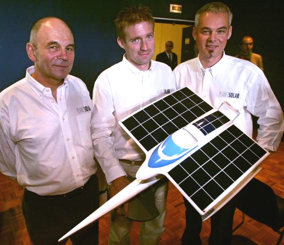 Gerard d Aboville and Raphael Domjan with the original PlanetSolar trimaran model design