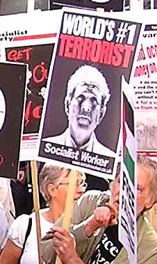 Anti-Iraq War protester in London carries a placard calling Bush the "World's #1 Terrorist"