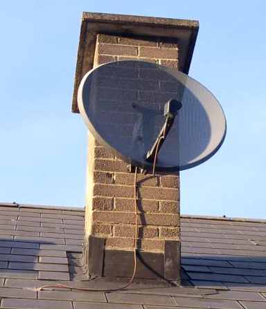 Sky_satelite_minidish_receiver_chimney_mounted.jpg