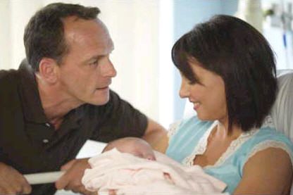 Eastenders Billy and Honey Mitchell with baby Petal