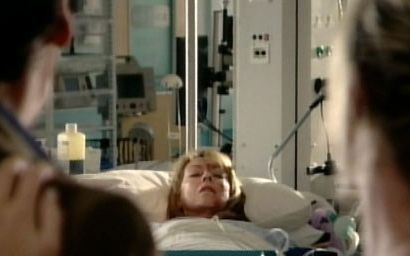 Holby City hospital ward patient in bed