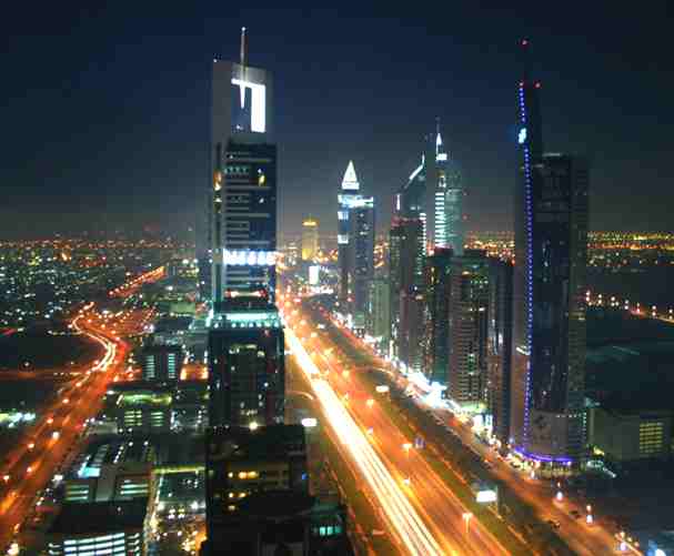 new york city skyline at sunset. Dubai city skyline at night