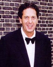 Charles Saatchi wearing a tuxedo