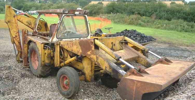 An old JCB backhoe, still working hard for it's operator