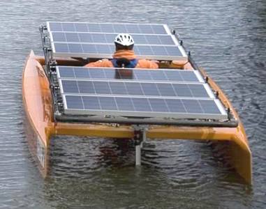 Solar powered one man catamaran orange