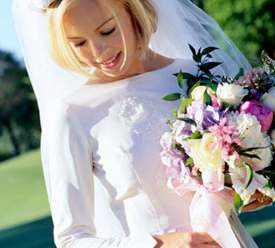 White wedding dress veil and flowers