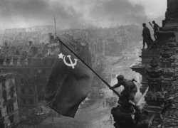 Berlin fell to the Red Army on 2 May. Here, the Hammer and Sickle is flown over the Reichstag