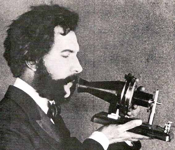 [Image: alexander_graham_bell_1876_speaking_into_telephone.jpg]