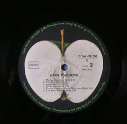 While the A-sides of singles and albums showed the familiar green apple, the flipsides displayed the apple cut in half. This example shows the German release of The Iveys' album Maybe Tomorrow.