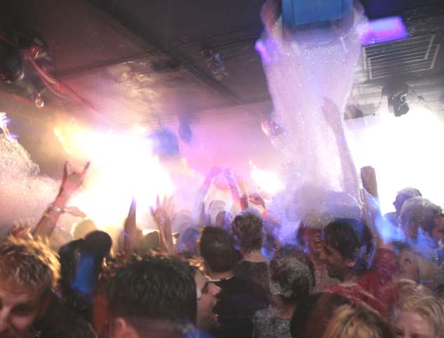 Nightclub foam party dancing fun