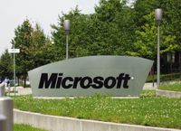 The Microsoft sign at the entrance of the German Microsoft campus, Konrad-Zuse-Str. 1, Unterschleiheim, Germany. Microsoft became an international company with headquarters in many countries.