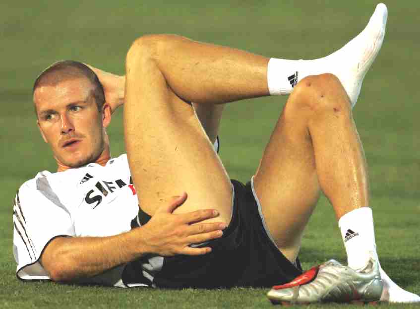 david beckham england team. David Beckham relaxing legs