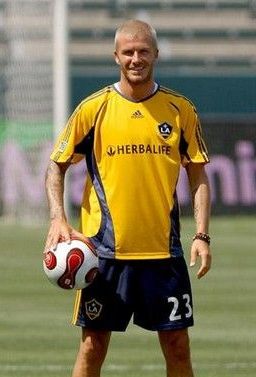 David Beckham wearing Herbal Life football shirt