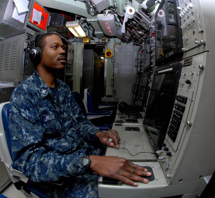 Sonar operator aboard a Los Angeles class attack submarine