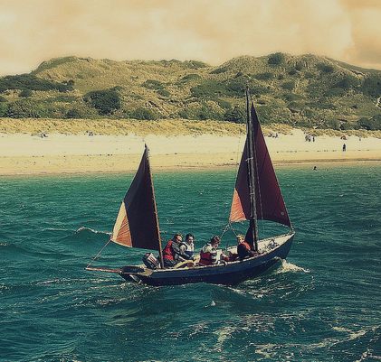 Swallows and Amazons sailing boat on lake