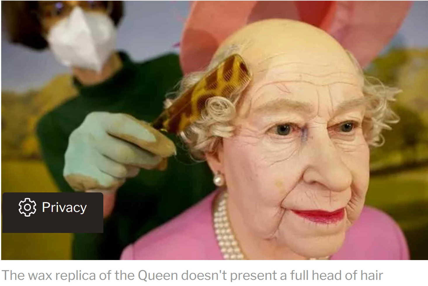 Bald headed Queen Elizabeth II waxworks head