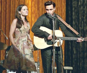 Reese Witherspoon (June Carter Cash) with Joaquin Phoenix (Johnny Cash) in Walk the Line