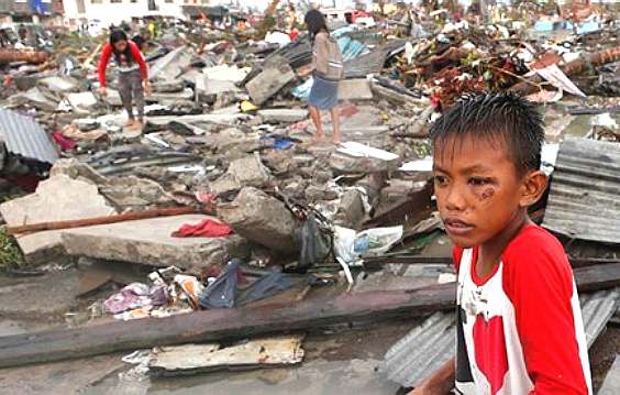 Typhoon hits the Philippines, children homeless search for relatives