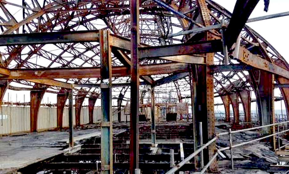 Burned out iron hulk of former Eastbourne icon