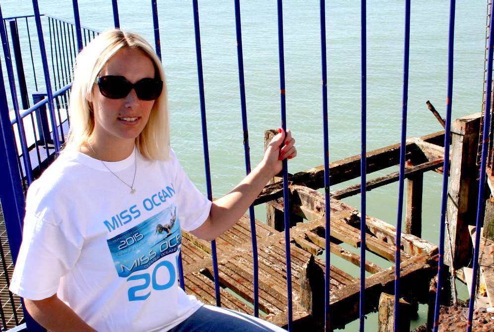 Miss Ocean event manager, Hayley, inspecting the rotting landing jetty