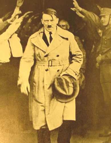 Adolf Hitler exiting Brown House after successful election 1930