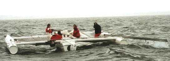 Dismasted trimaran at sea