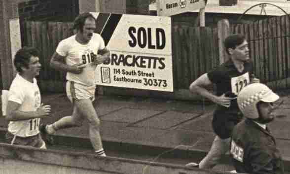Runner number 122 showing the strain, Nelson Kruschandl Eastbourne Fun Run Sussex