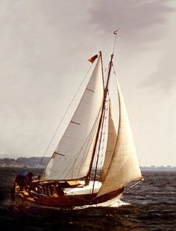 A traditional wooden sailing boat (monohull)