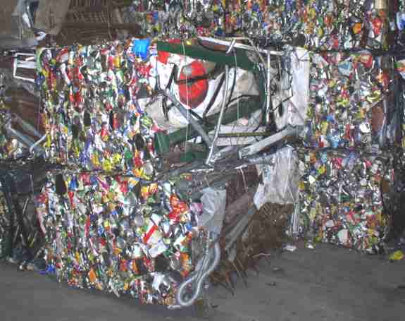 Steel crushed and baled for recycling at Ozark Adventist Academy