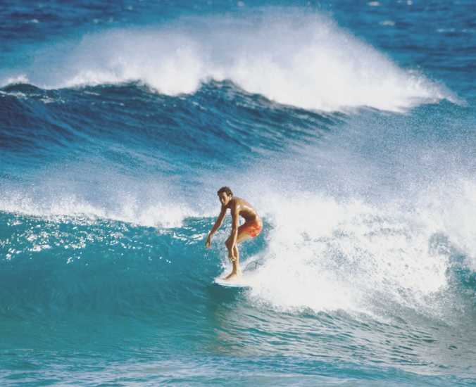 Surfing waves in Hawaii