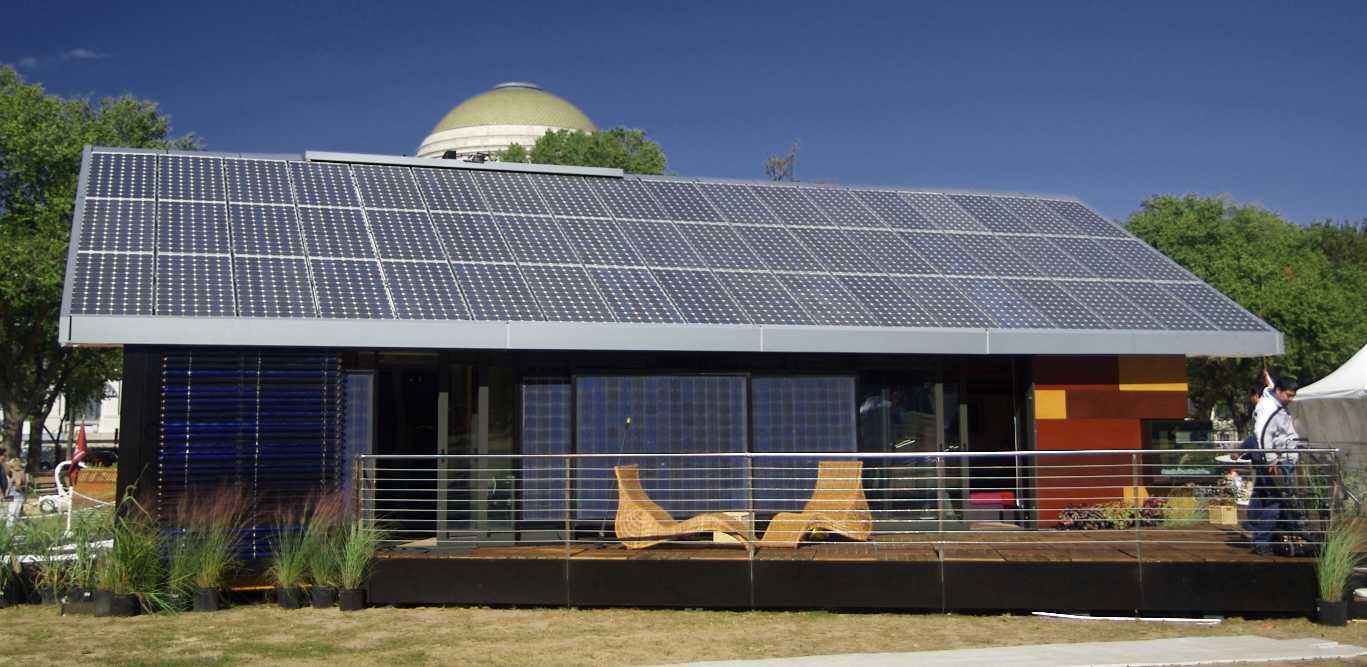 Eco home with solar panels and passive glazing
